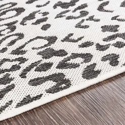 Kirklands Home Cauli Leopard Print Round Outdoor Rug, 7 ft. Black